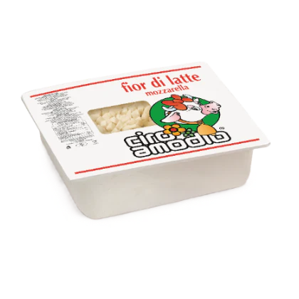 Block of mozzarella cheese in a white container with 